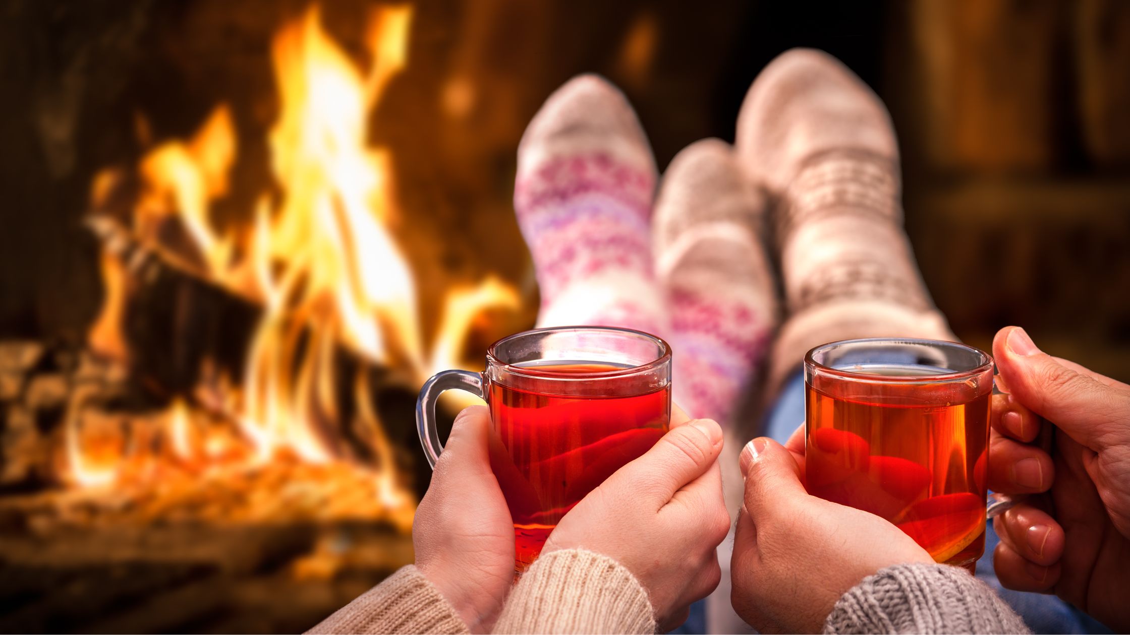 How To Keep Warm by a Fireplace Drinking Tea and Wearing Wool Socks.