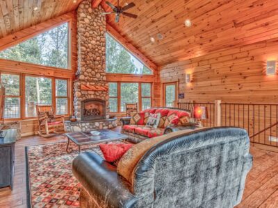 Stunning river views, private hot tub, custom log